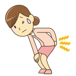 腰を押さえる女性